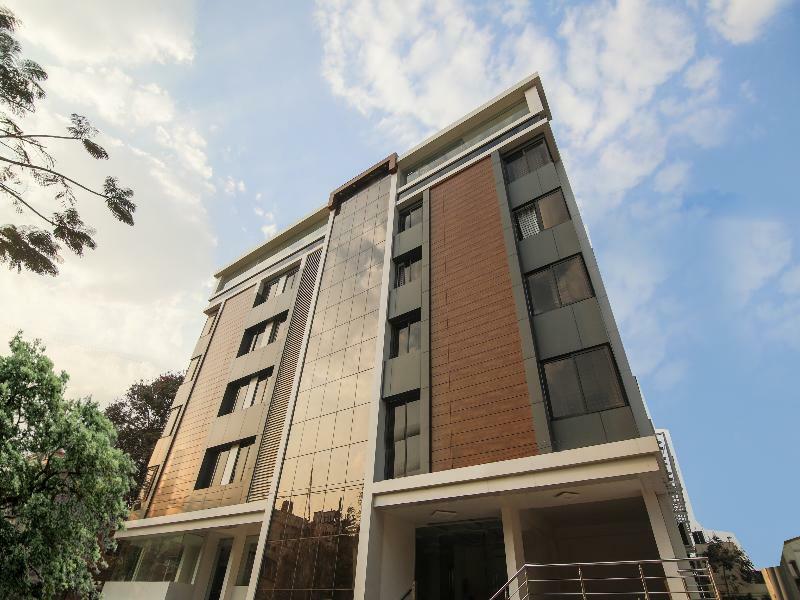 Hotel Super Grand Collection O Near Sarjapur Road Near 7D Voyage Bangalore Esterno foto